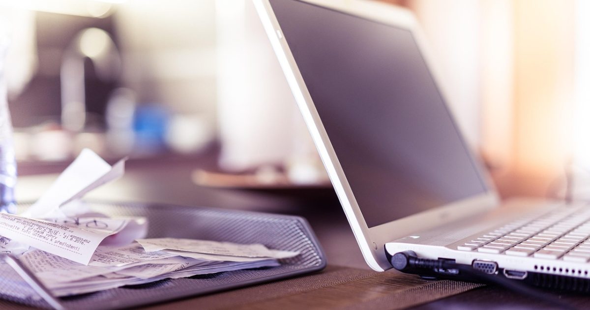 Computer, desk, electronics, keyboard, laptop, papers, receipts, desk, receipts, receipts, receipts, receipts, receipts
