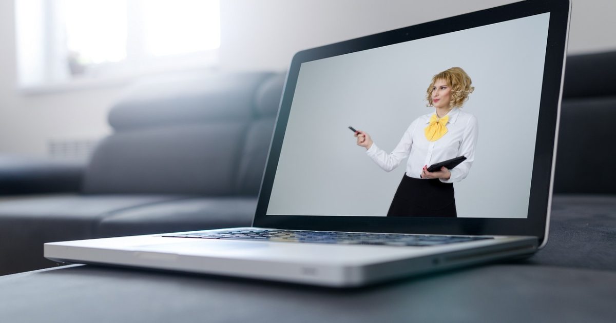 Online,  meeting,  virtual,  skype,  zoom,  video,  conference,  videoconference,  webinar,  remote,  working,  work,  from,  home,  computer,  businesswoman,  pointing,  couch,  laptop,  blue computer,  blue home,  blue laptop,  blue work,  blue video,  blue meeting,  blue online,  blue videos,  blue zoom,  blue conference,  blue couch,  video,  webinar,  webinar,  webinar,  webinar,  webinar